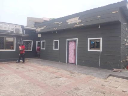 A 4 bedroom house plus 2 bedroom boys quarters is up for sale.